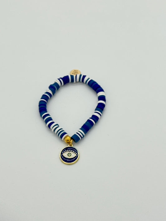 Pulsera navideña con discos de arcilla: Ojo azul